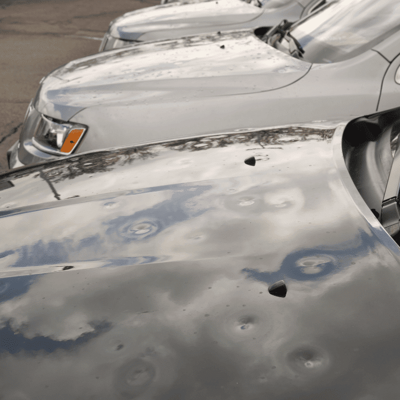 serious hail damage on car