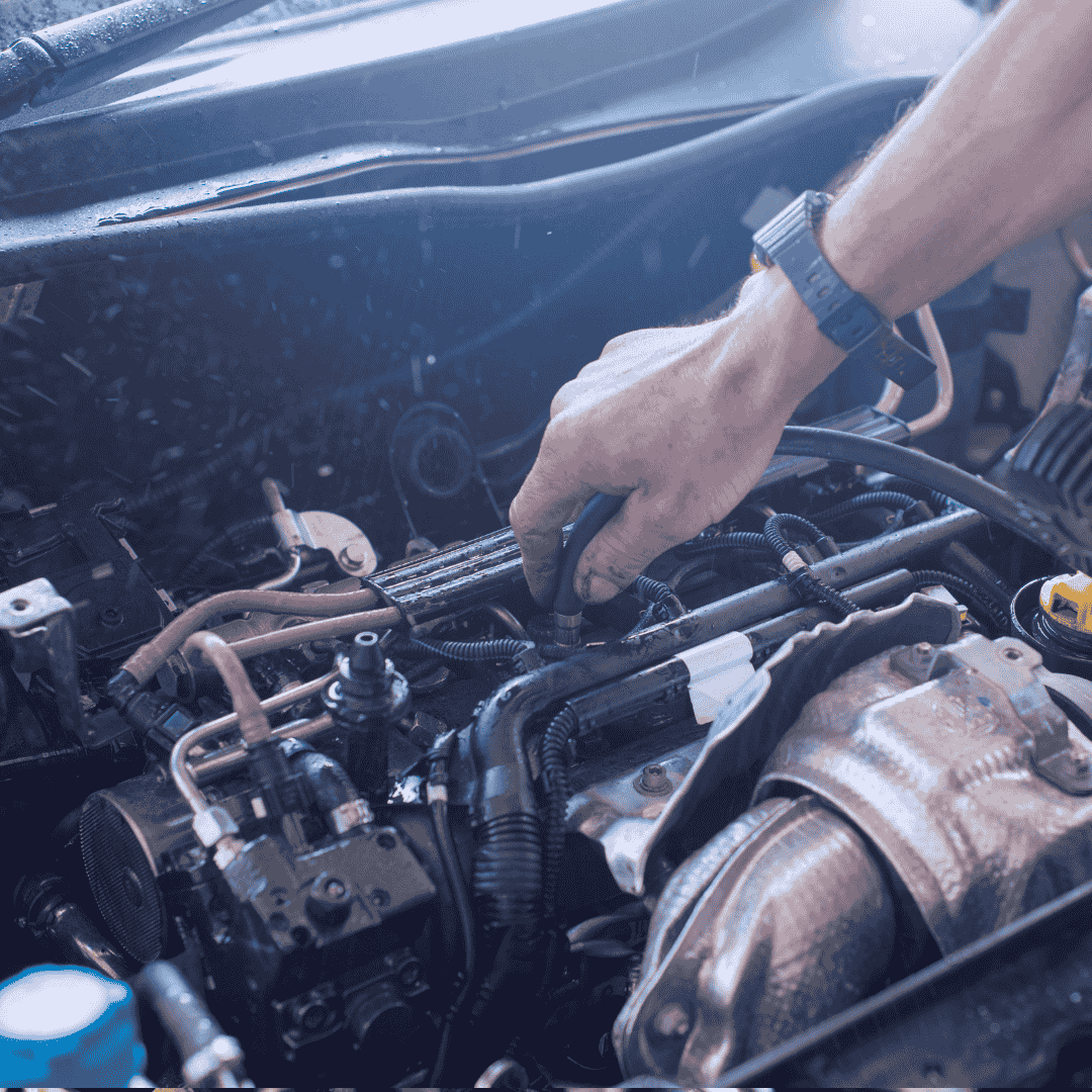 mechanic repairing engine
